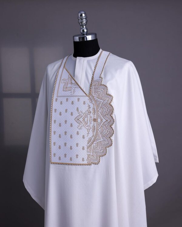 A white embroidery details agbada